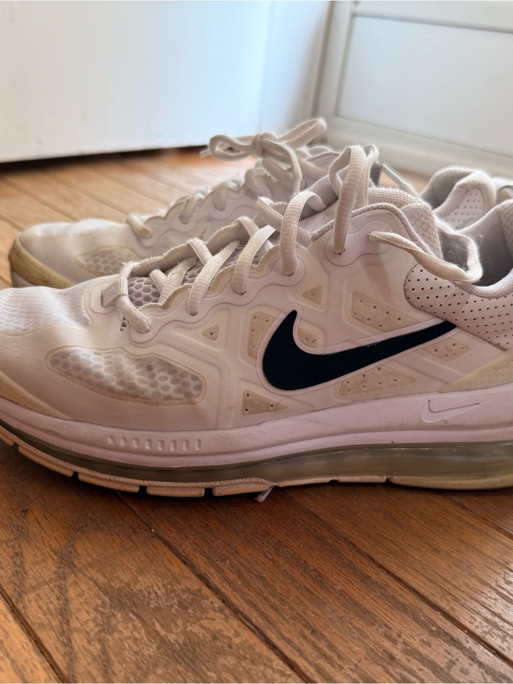 Nike White Athletic Sneakers with Black Swoosh